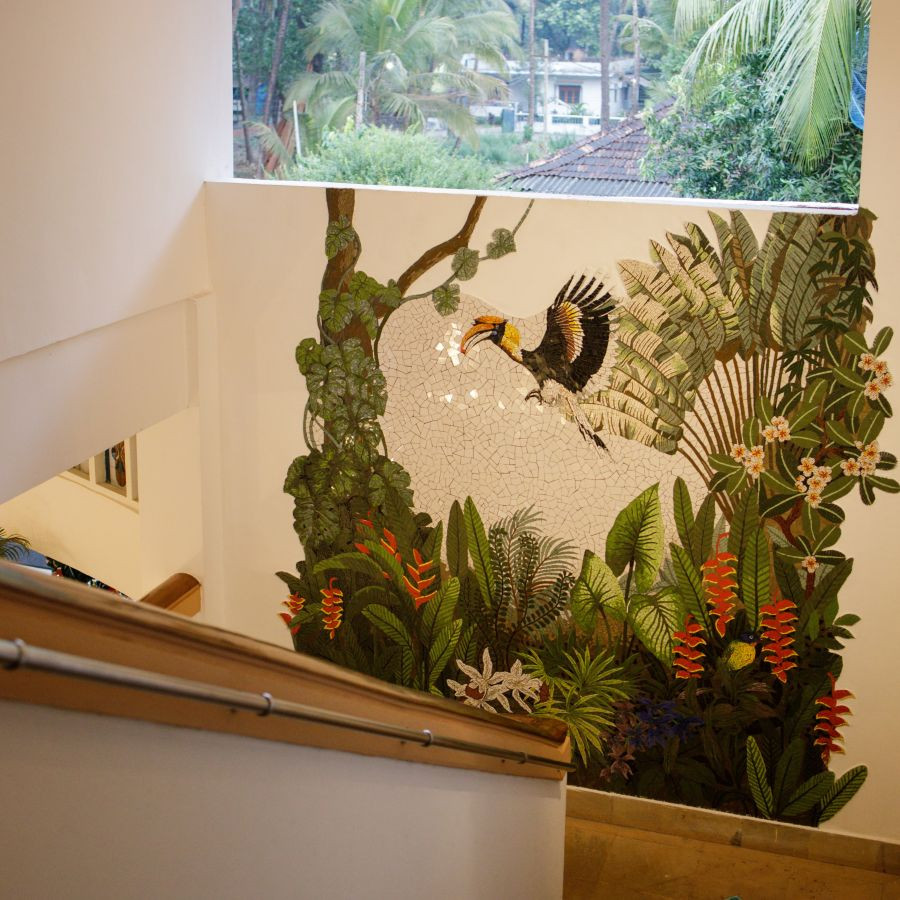 Exquisite mural staircase at Heritage Village Resorts &amp; Spa, Goa, a perfect photo opportunity.