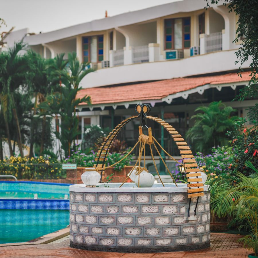 Decorated well near the swimming pool at Heritage Village Resorts &amp; Spa, Goa, a picture-perfect detail of the resort.