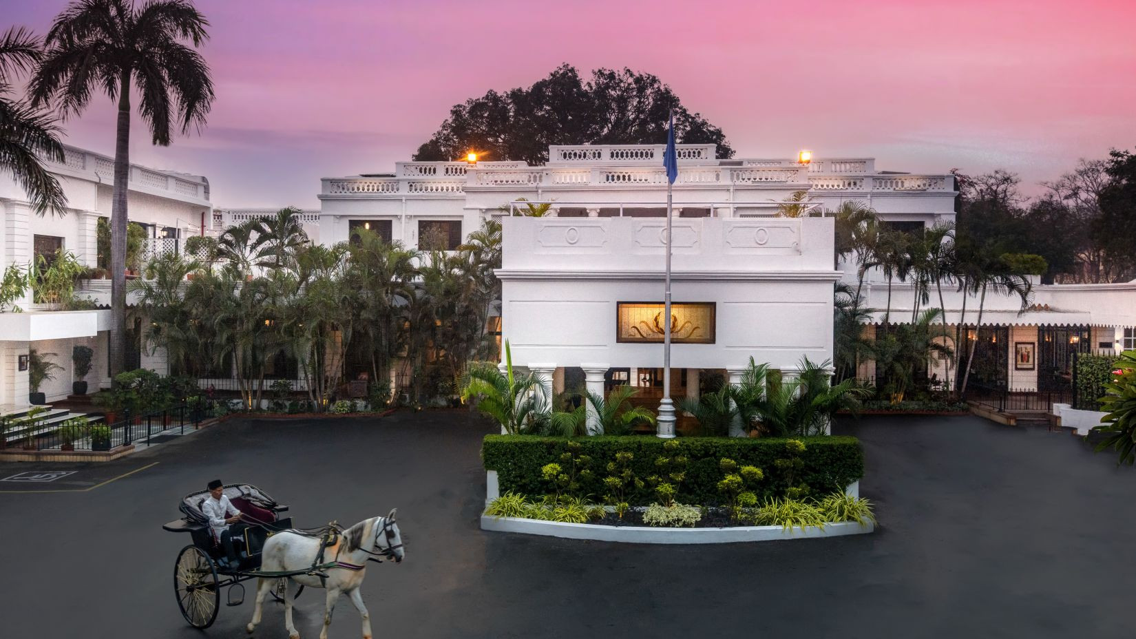 Exterior view of Jehan Numa Palace Bhopal, showcasing its grand architecture and lush surroundings, a prime destination for a spa retreat near you in Bhopal