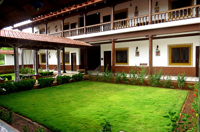 Ayurvedic treatment room at Balkatmane Heritage Spa Resort in Udupi, equipped for traditional Panchakarma therapies for rejuvenation and stress relief.