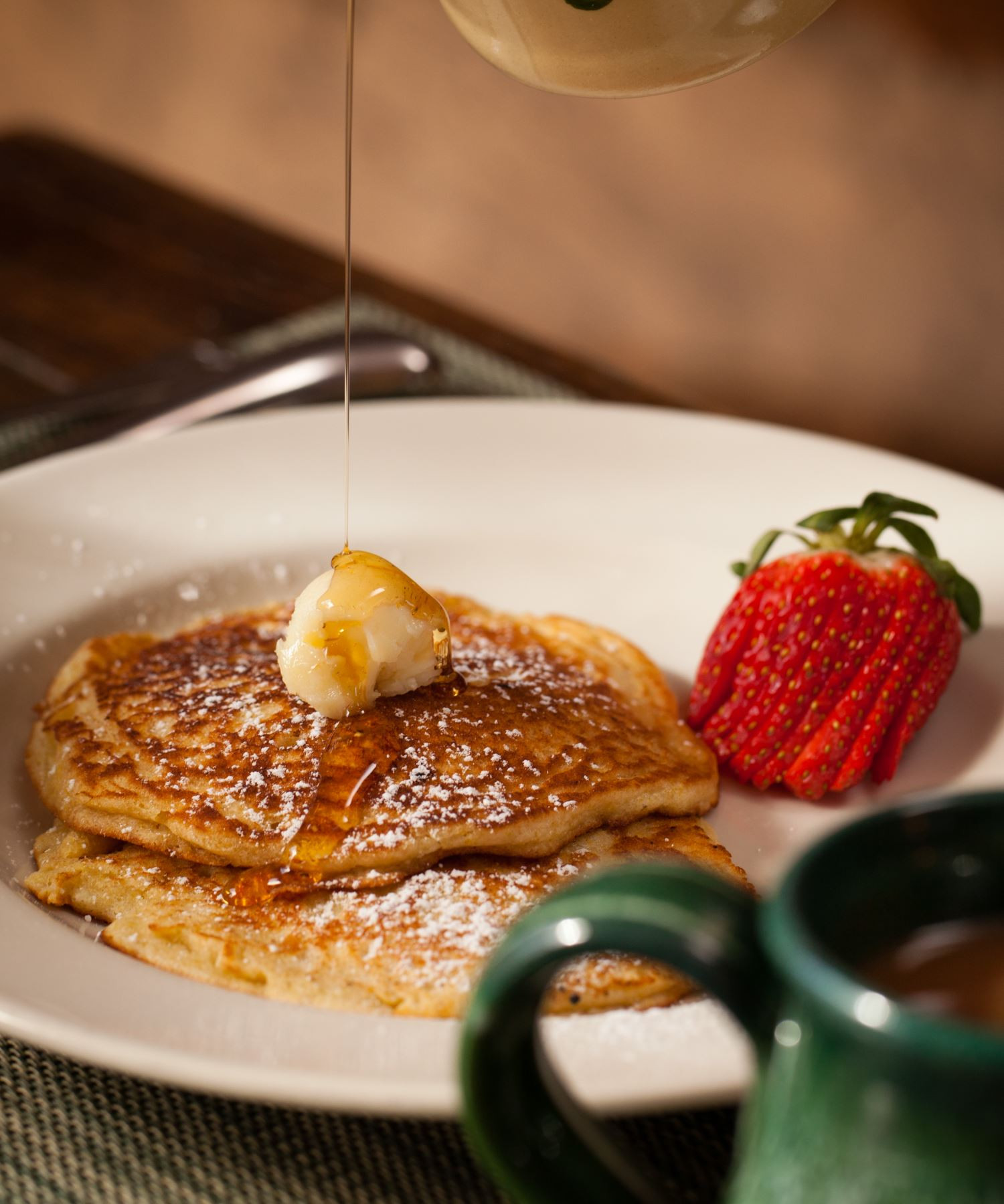 alt=A plate with breakfast food including eggs, bacon, and toast at the Inn & Spa at Cedar Falls Ohio.