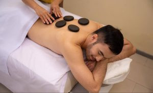 Serene spa treatment room at Novotel Manila Araneta City, showcasing plush massage beds and soft lighting for ultimate relaxation.