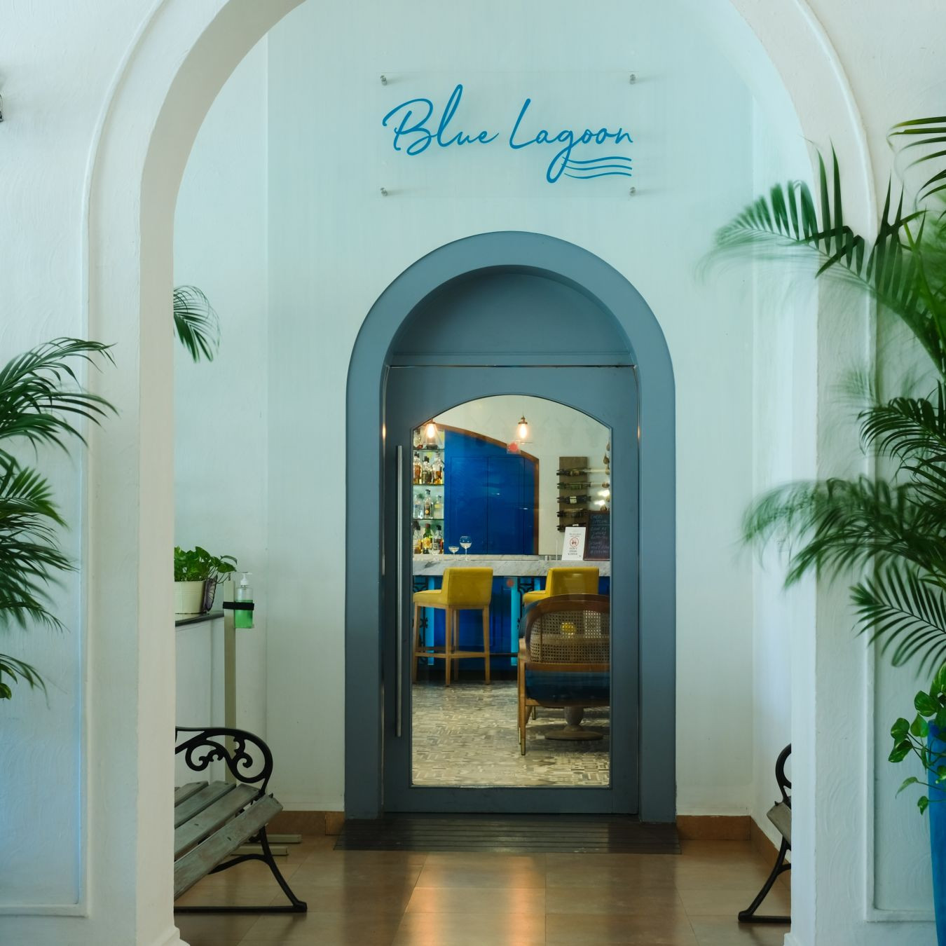 Blue Lagoon Bar entrance at Heritage Village Goa resort and spa, inviting guests for a refreshing drink and relaxed atmosphere.