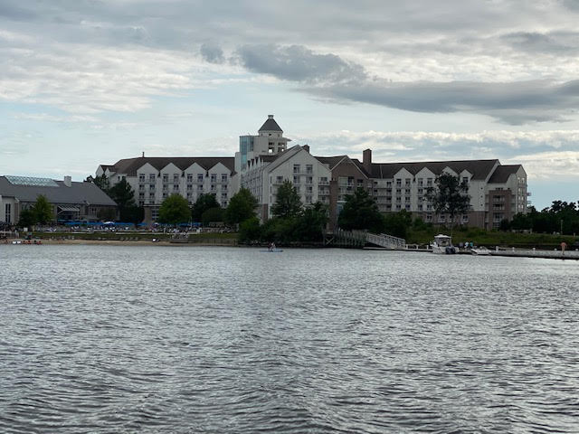 a large building next to a body of water