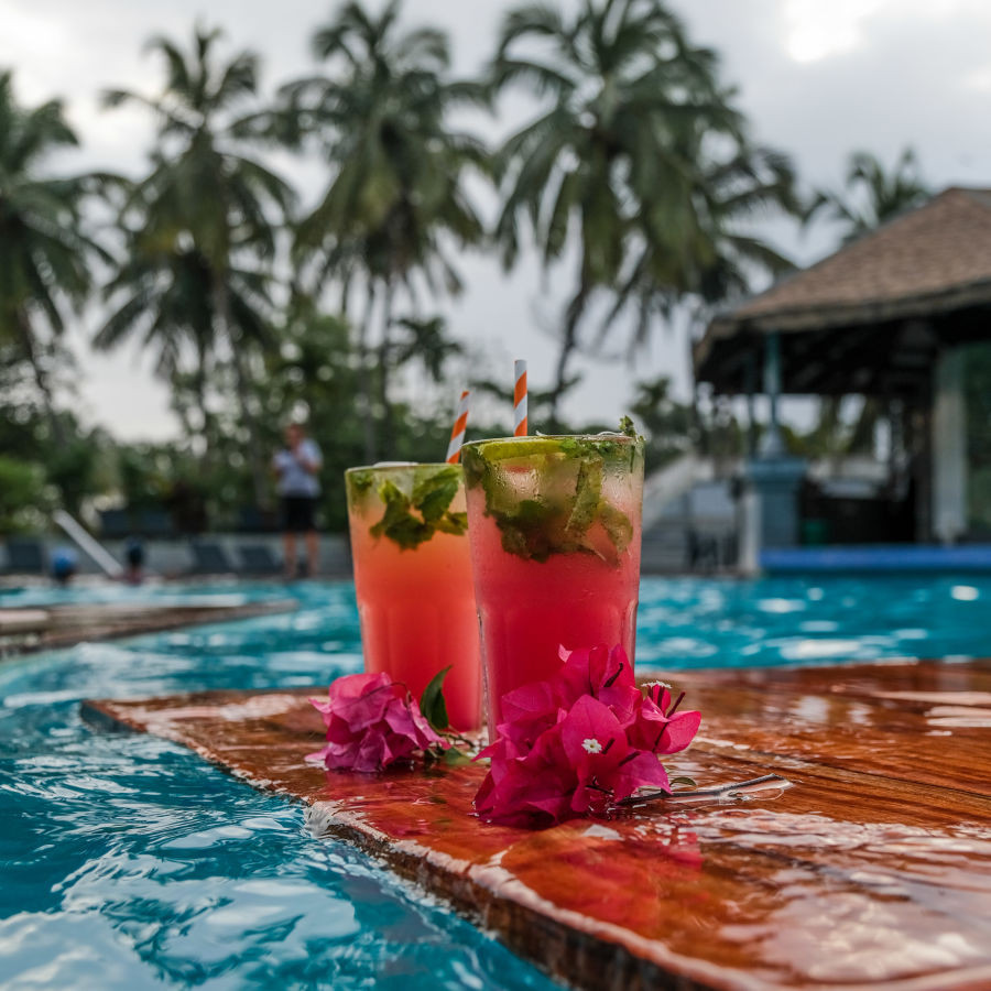 Signature cocktails by the pool at Heritage Village Resorts &amp; Spa, Goa, at Blue Lagoon bar.