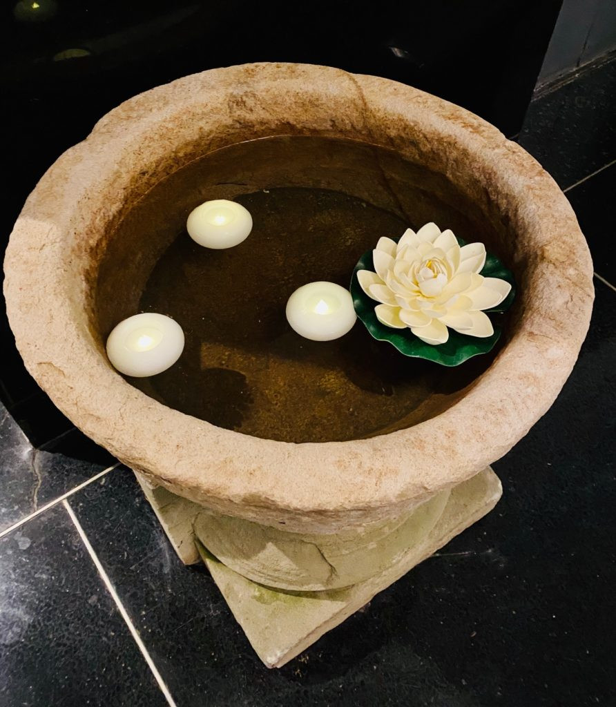 Lotus flower and candles at Joseph Anthony Retreat Spa and Salon