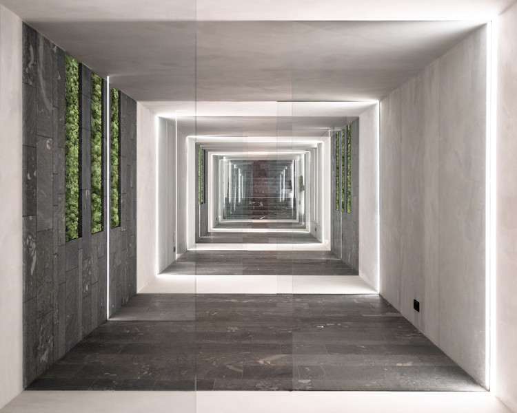 Connecting corridor in the Spa Pavilion linking fitness area with vertical moss plantings