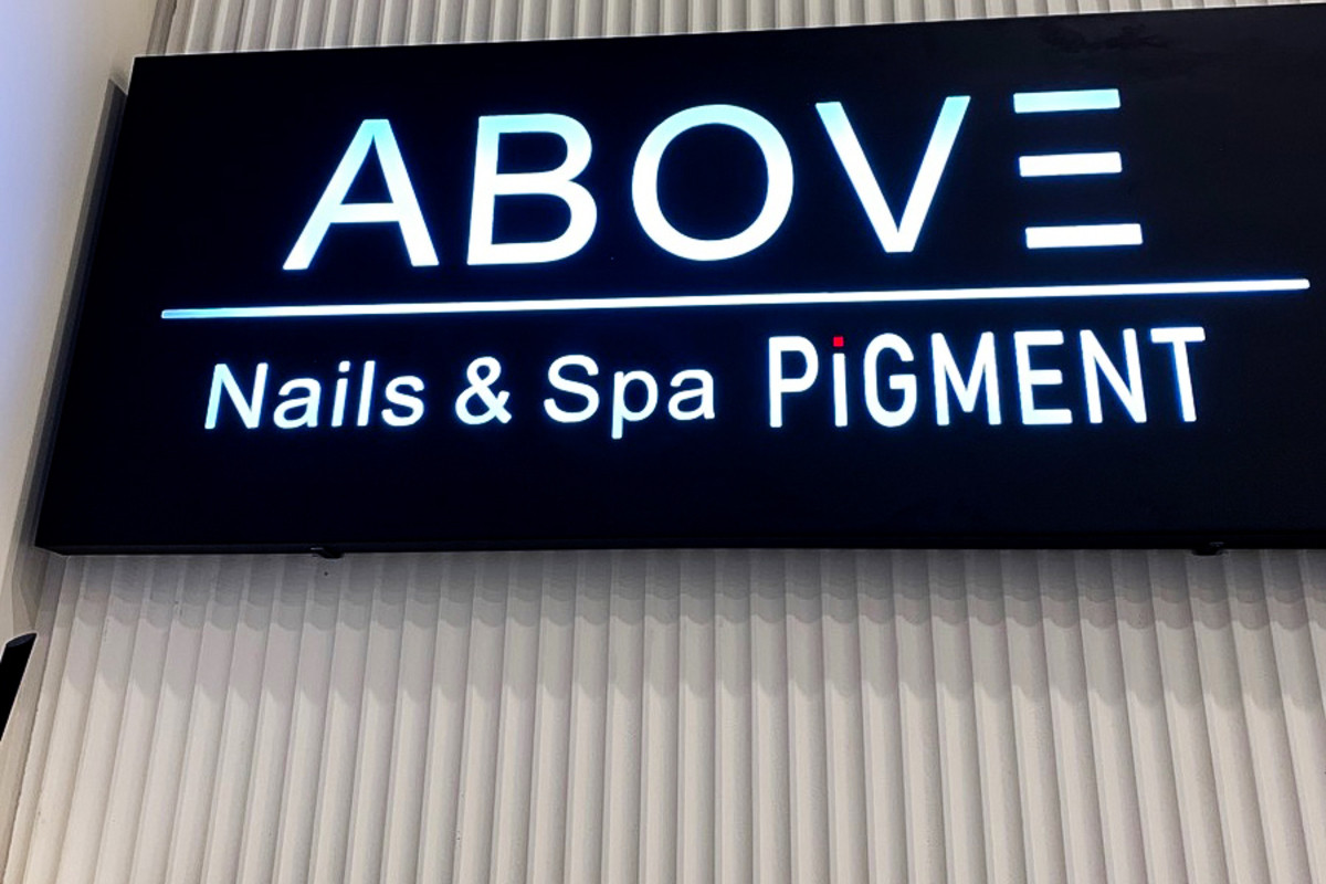 Manicure and pedicure at Above Pigment Nails & Spa in black and white style
