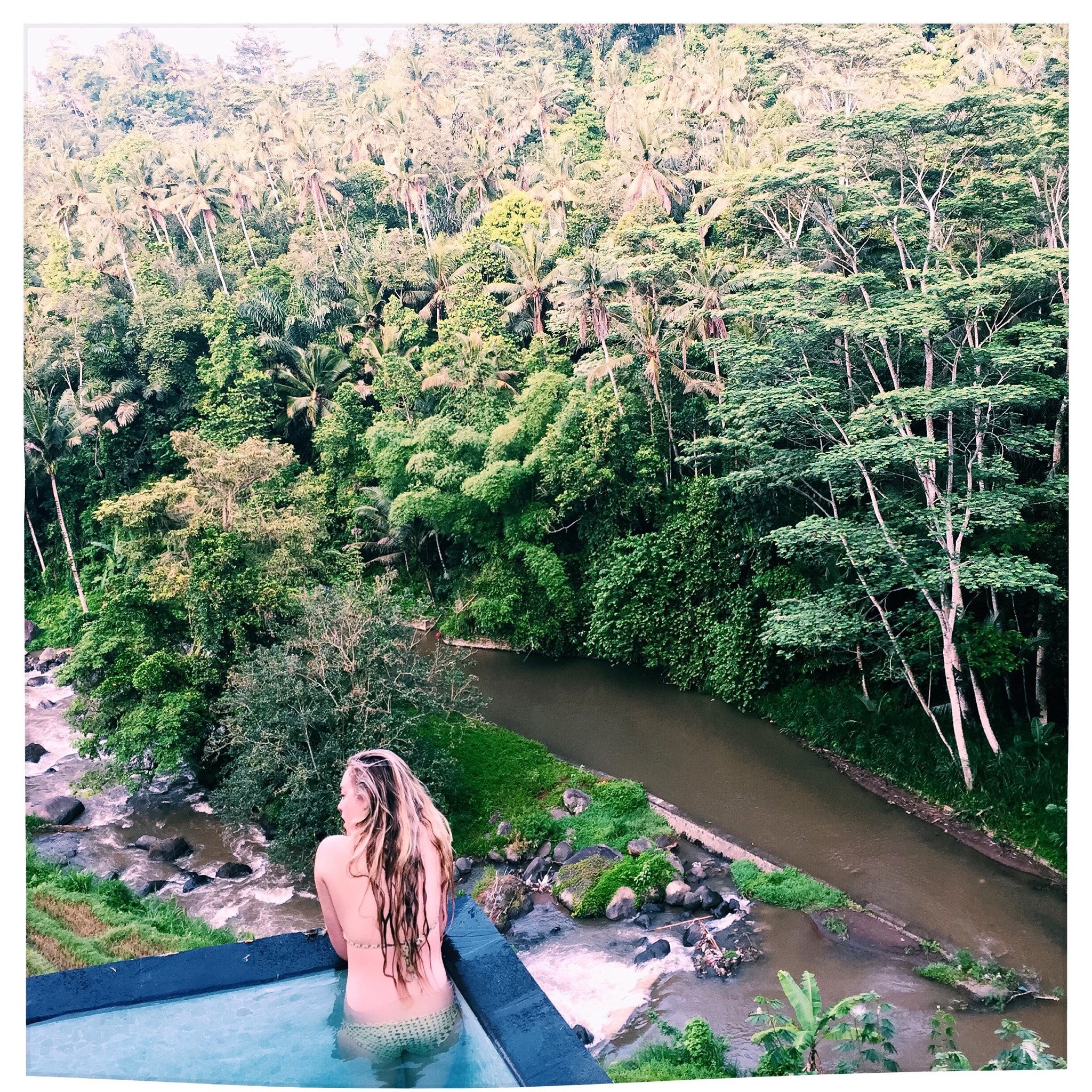Rustic luxury Balinese room with a stunning private pool overlooking the river, perfect for relaxation and romantic getaways