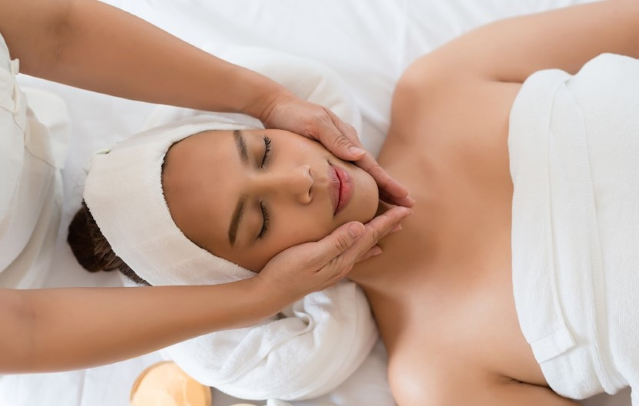 Woman enjoying a day at the spa with a comforting atmosphere
