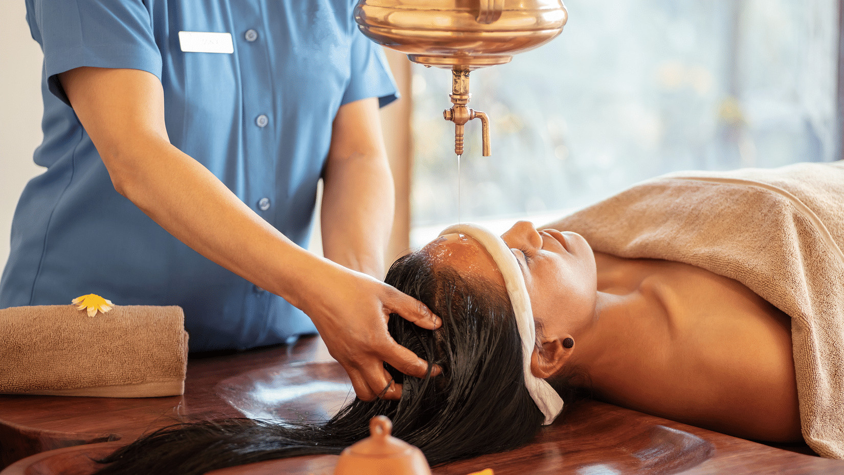 A serene spa treatment room with soft lighting and calming decor, enhancing the atmosphere for relaxation and rejuvenation.